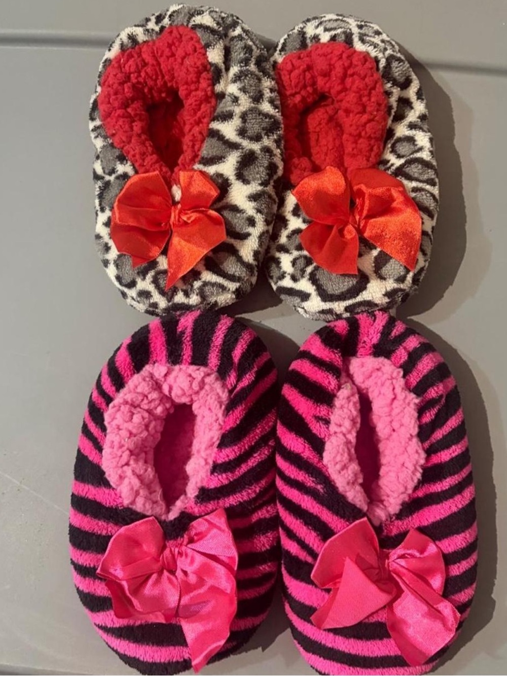 Set of 2 Plush Kids Slip-On Slippers — Pink Zebra & Red Leopard Fleece Bow Style